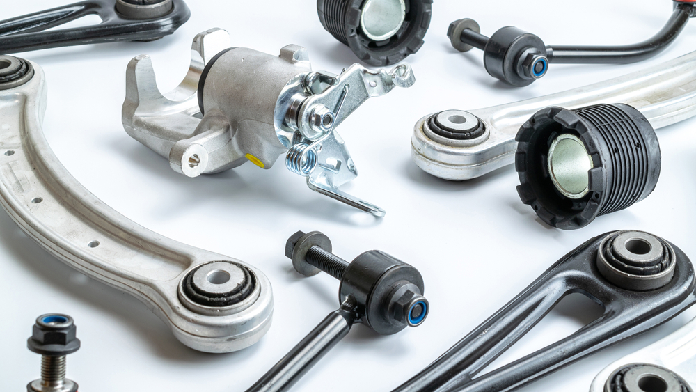 Random car parts on a white back ground. - Dann's Discount Auto Sales Visalia, CA