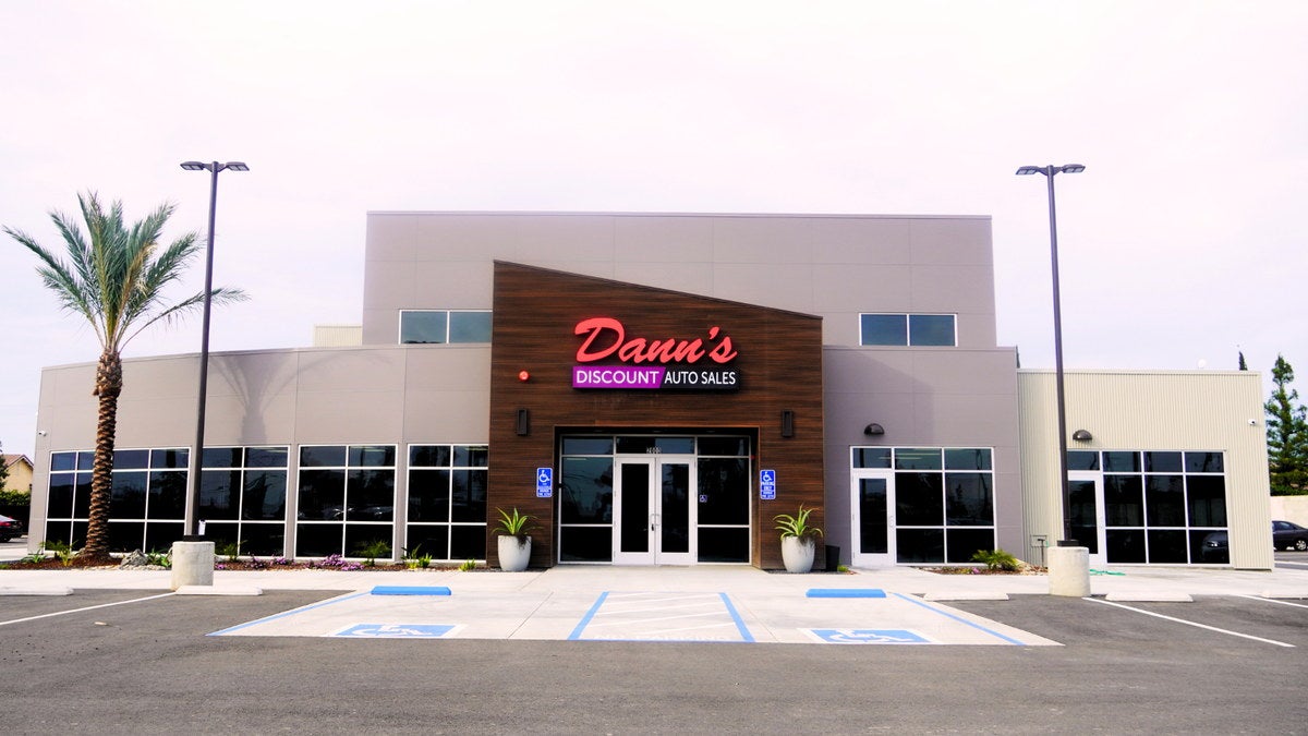 Dann's Discount Auto Sales used car dealership storefront in California's Central Valley