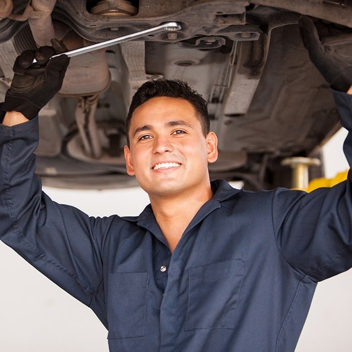image of a mechanic smiling