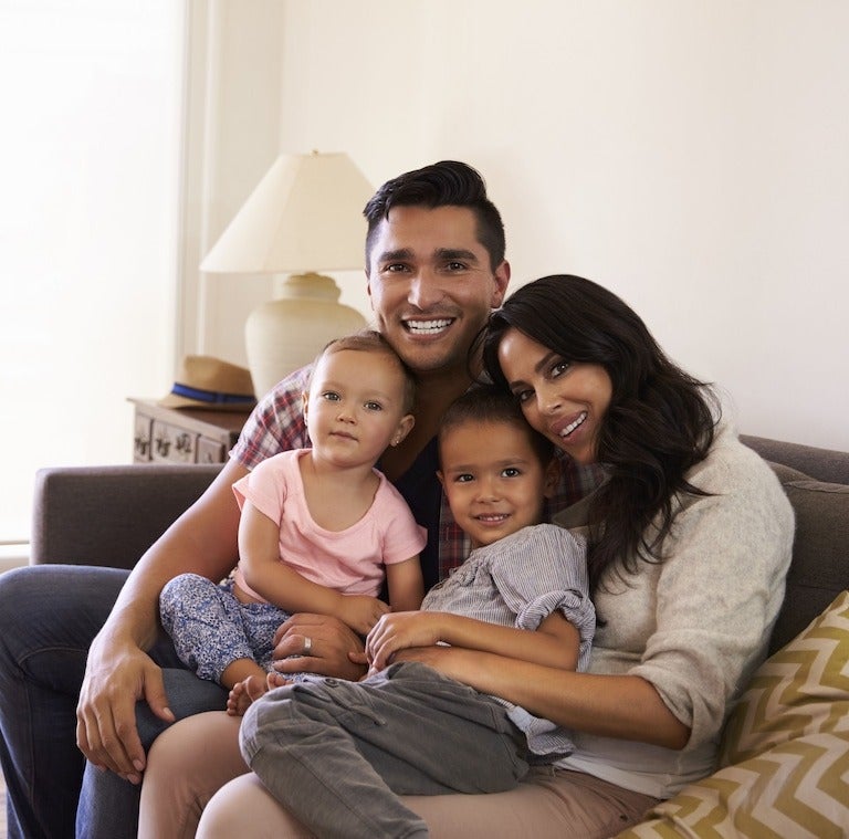 image of a family smiling